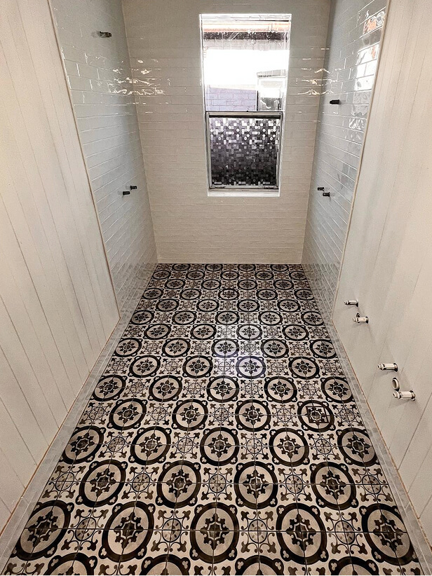 Patterned floor tiles installed by Kev Winchester